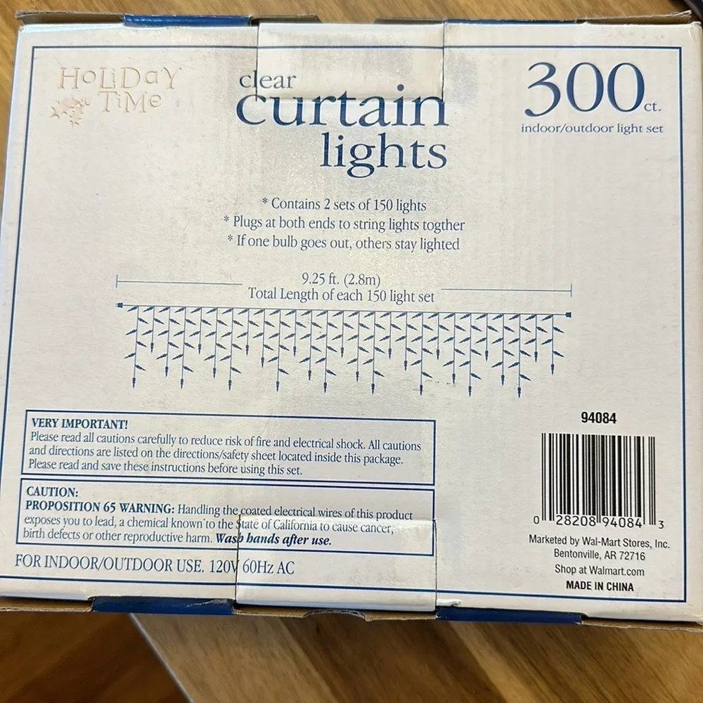 HOLIDAY TIME clear curtain lights 300 ct. 2 pck